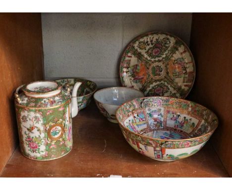 A 20th century Cantonese famille rose punch bowl, decorated with figures in a landscape with birds and flowers, printed mark 