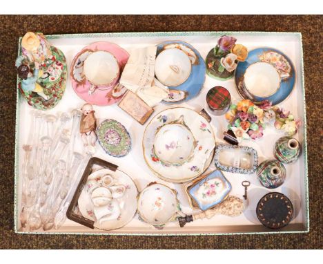 A selection of 19th and 20th century miniature ceramics including Meissen floral encrusted teacups and saucers (a.f.), a porc