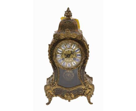 A 'Boulle' striking mantle clock, retailed by Howell & James, London, circa 1890, twin barrel movement striking on a gong, 31