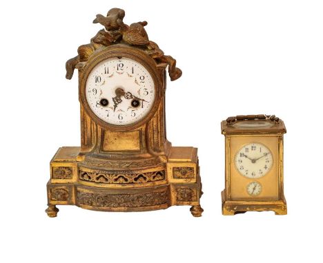 A French gilt metal striking mantel clock, circa 1890; and a French carriage timepiece with alarm, circa 1900