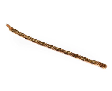 A gate link bracelet, stamped '9CT', length 18.3cmCondition report: The bracelet is in good condition with slight wear. It fa