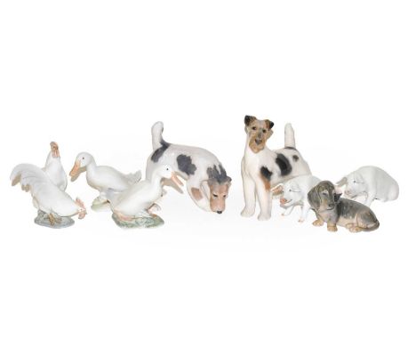 Royal Copenhagen animal models, comprising three dogs, two pigs, two ducks and two cockerelsCondition report: All items in ge