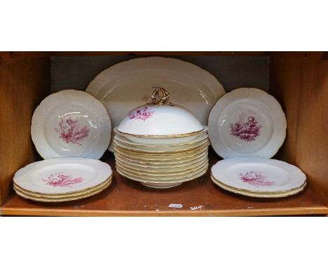 A Mintons part dinner service, with ozier moulded borders, gilt rims and enamelled in puce camaieu with winged cherubs at var