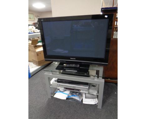 A Panasonic Viera 37" plasma TV on stand together with a Samsung DVD recorder and a Tevion DVD VCR recorder, all with leads, 
