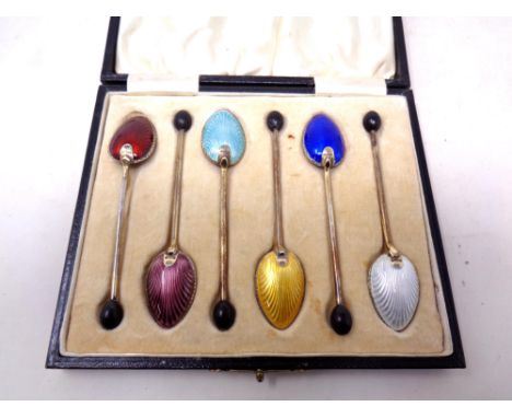 A cased set of six silver and enamel teaspoons CONDITION REPORT: These are in good condition, there are no chips to the ename