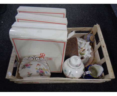 A crate containing assorted ceramics to include boxed Spode cabinet collection shell dishes, Aynsley vase, character jug, car