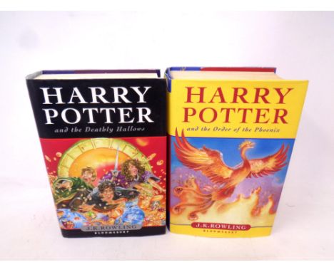 Two first edition Harry Potter books, The Order of the Phoenix and The Deathly Hallows