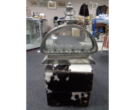 A horse hair upholstered cube stool together with an ornate white metal tea light holder 