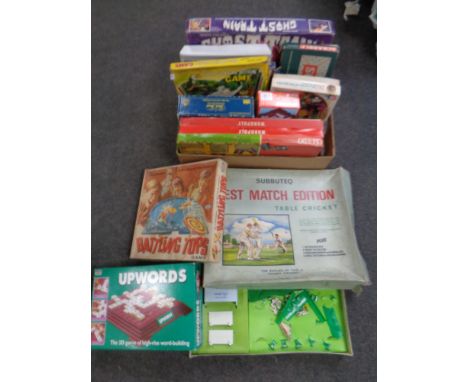 A box of vintage board games to include Subbuteo table cricket, Monopoly, Cluedo etc 