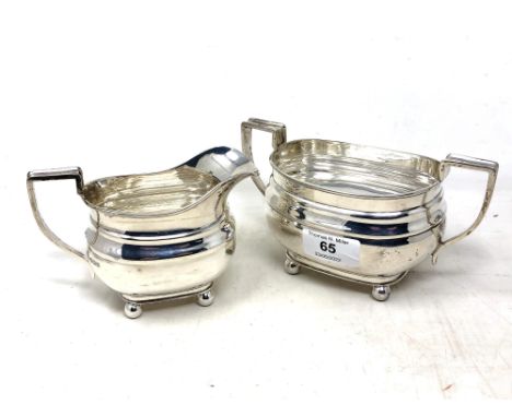 A silver sugar pot and matching cream jug, William Hutton &amp; Sons Ltd, Sheffield 1944. (2) CONDITION REPORT: 430g gross