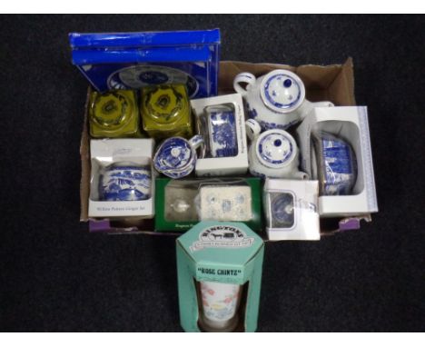A box containing a Ringtons ceramics to include willow patterned tea ware, ginger jar, calendar plates, heritage collection c
