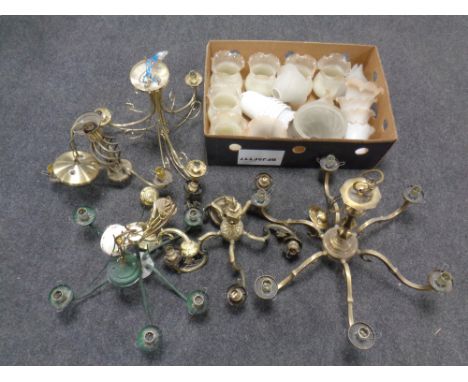 Six assorted brass and metal chandeliers together with a box containing glass light shades 