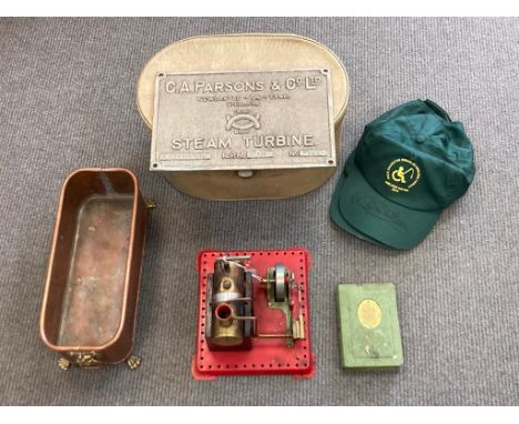 A Mamod live steam engine, together with a metal plaque Parsons steam turbine, a George VI metal money box, a copper planter,
