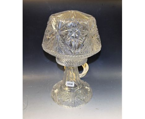 A heavy cut glass table lamp