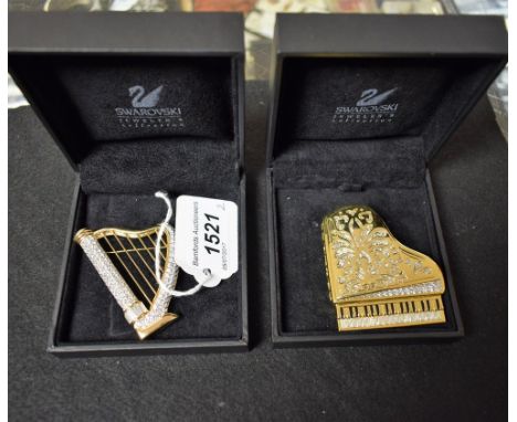 A Swarovski crystal grand piano brooch, boxed, another, harp (2)