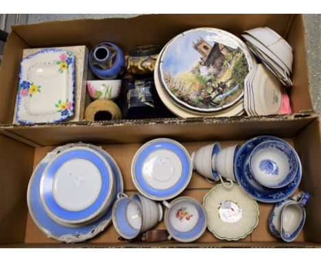 Ceramics -  a Karrlsbad porcelain tea set, powder blue border, comprising six cups, nine saucers, eleven side plates, two bre