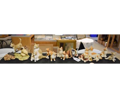 A Sherratt and Simpson model of a cat on a garden spade, other similar cat and kitten groups (ex-shop stock) 