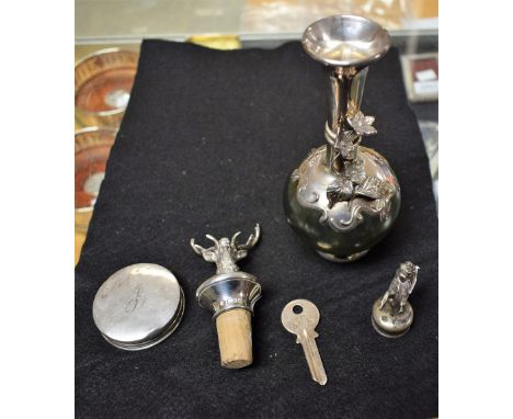 A silver compact/patch box, Birmingham 1904, 33.7g; a silver key, London 1978, 12.5g; others, a stag's head bottle stopper, e