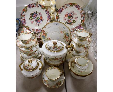 Ceramics - a late 19th Century tea service, dog rose and cornflower pattern on pale cream ground, gilded detail, to include t