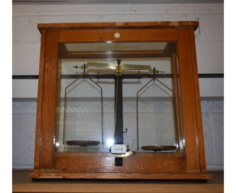 A set of Phillip Harris Ltd scientific powder scales, glazed case