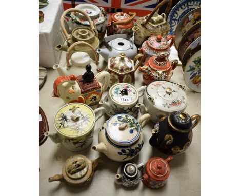 Teapots - a Japanese Satsuma teapot modelled as an elephant; a Chinese teapot hand painted with sparrows among bamboo, the sp