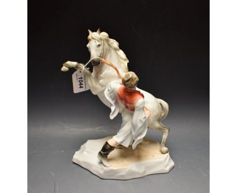A Herend Hungarian model of rearing horse and handler   Condition Report:  Approximately 25cm high, generally good condition