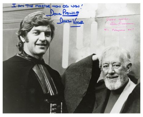 STAR WARS: A NEW HOPE (1977) - David Prowse and Alec Guinness-Autographed Still - A black-and-white still from behind-the-sce
