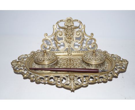 Early brass inkwell