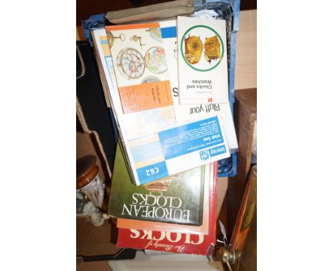 Box of clock reference books 