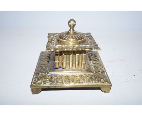 Early brass inkwell