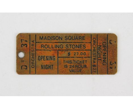 The Rolling Stones - Prototype metal ticket for Madison Square Gardens opening night, 3 x 7 cm. 