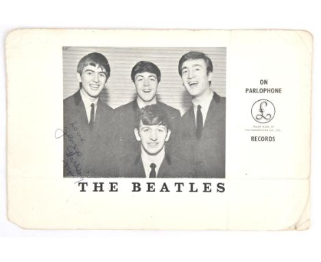 The Beatles  George Harrison Autographed Parlophone Records photo card. Signed on the front, Love George Harrison, 9 x 12.5cm