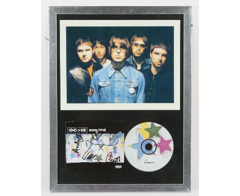 Oasis Signed Songbook CD cover, signed by the band including Noel and Liam Gallagher, framed, 33 x 43 cm. Provenance: Signed 