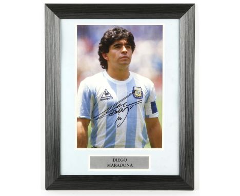 Diego Maradona signed photo, with certificate of authenticity, framed 35x45cm.