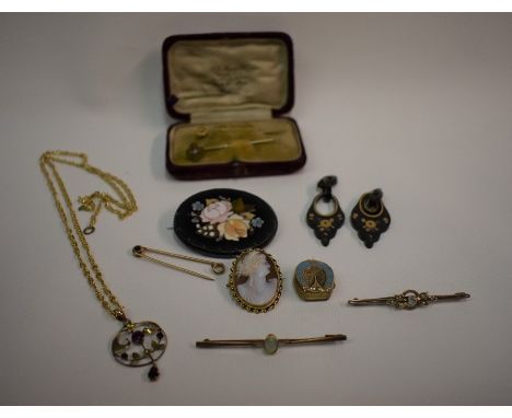 A collection of Victorian and later jewellery including three stick pins, three bar brooches, oval shell cameo, open pendant,