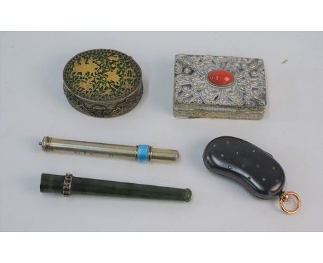 A silver and enamel propelling pencil, a green hardstone cigarette holder mounted with stone set inscription 'Marjory', a gun