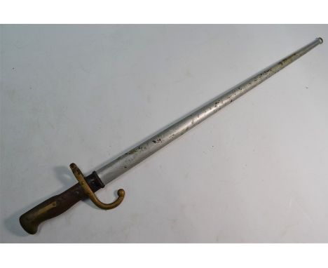 A 19th century French 1874 pattern bayonet, the 51.5 cm blade with flattened back-rib inscribed Mme d'Obemes de St. Etienne 1