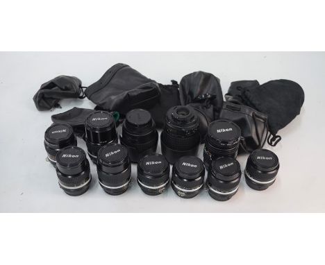 A selection of eleven Nikon SLR camera lenses including - 24-50 mm; 135 mm; 55-200 mm (2); 24 mm; 105 mm; 35 mm; 28 mm; 55 mm