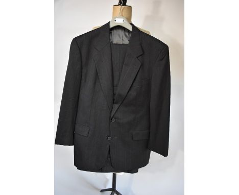 A gentleman's Hugo Boss dark grey pure lightweight wool suit, 50 cm across chest, 36" waist, the trousers with turn-ups and a