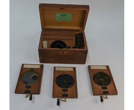 A set of ten Newton & Co of Fleet Street (London) astronomical mechanical magic lantern slides, each mahogany-framed slide wi