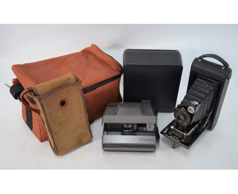A Polaroid Image System Instant camera in box, with accessories to/w a Kodak IA Autographic folding camera (2)