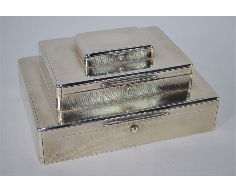 Asprey: A fine quality integral stacked cigar/cigarette and matchbox with engine-turned decoration and button-catches, Cedar 