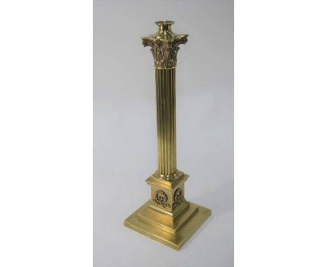 An antique heavy brass Corinthian column lamp base on stepped square plinth, 50 cm high&nbsp;good, clean original, has been p