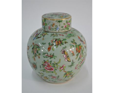 A 19th century Chinese famille rose jar and cover, typically painted in polychrome enamels with birds, butterflies and floral