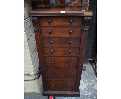 A Victorian mahogany Wellington 'secretaire' chest of five drawers and a double dummy-drawer front fitted secretaire drawer r