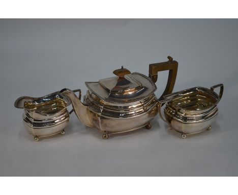 A heavy quality silver three-piece tea service with gadrooned rims and ball feet, S. Blackensee &amp; Son Ltd., Chester 1927,