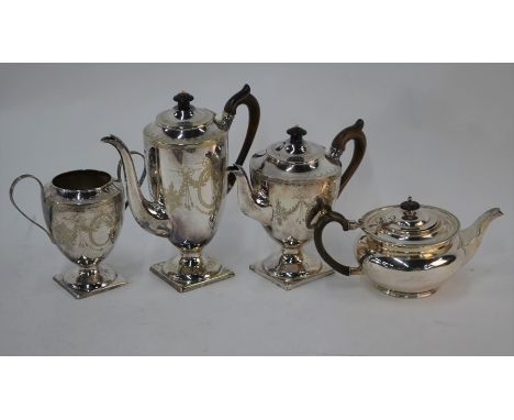 A circular silver teapot of compressed melon form, on moulded foot-rim, Walker &amp; Hall, Sheffield 1910, 20oz gross to/w an