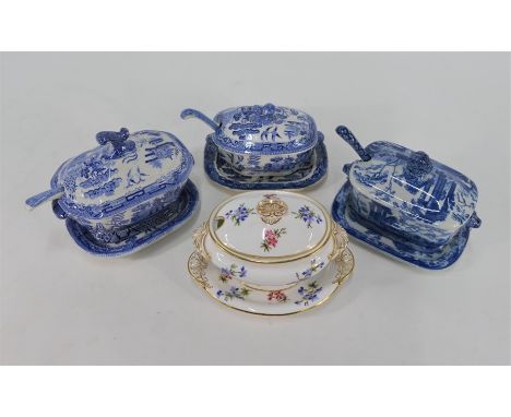 A 19th century pearl ware blue transfer printed sauce tureen, cover stand and ladle with lion mask handles and finial, to/w t