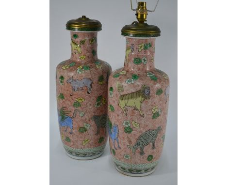 A pair of 19th century Chinese famille verte rouleau vases, Bangchui ping, each decorated with scattered florets arranged aro