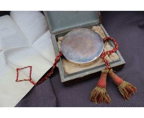 A George III silver desk seal, a circular box in two parts engraved to the top with a derivation of the Royal Arms of King Ge
